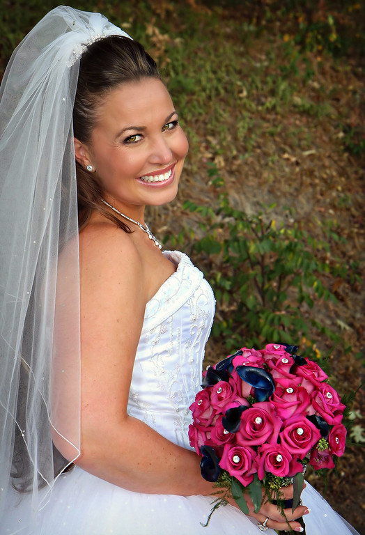 IMAGE: http://jwilsonphotography.smugmug.com/Weddings/Janell-and-Rob-92609/IMG426/747546306_CEQCw-XL.jpg